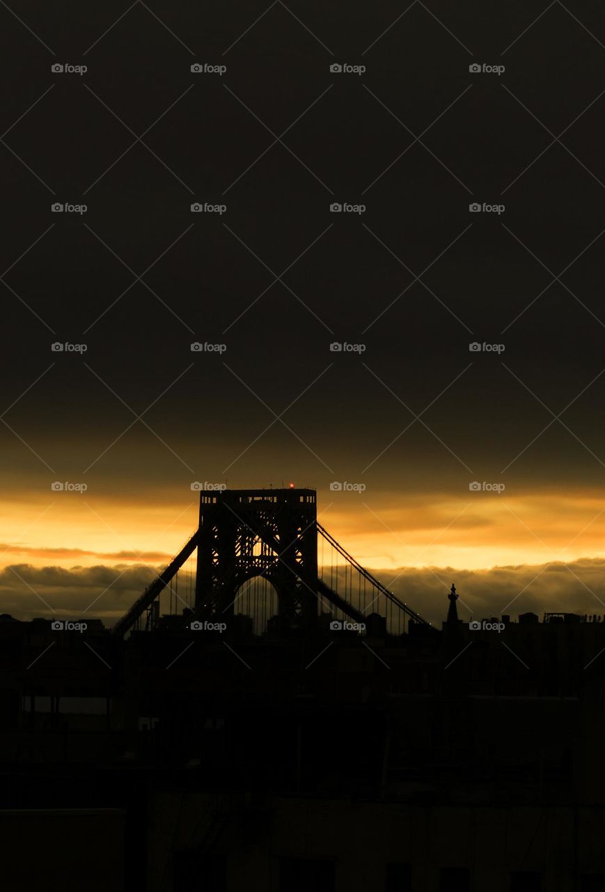 Urban Sunset Serenity: Bridge Over Twilight Waters