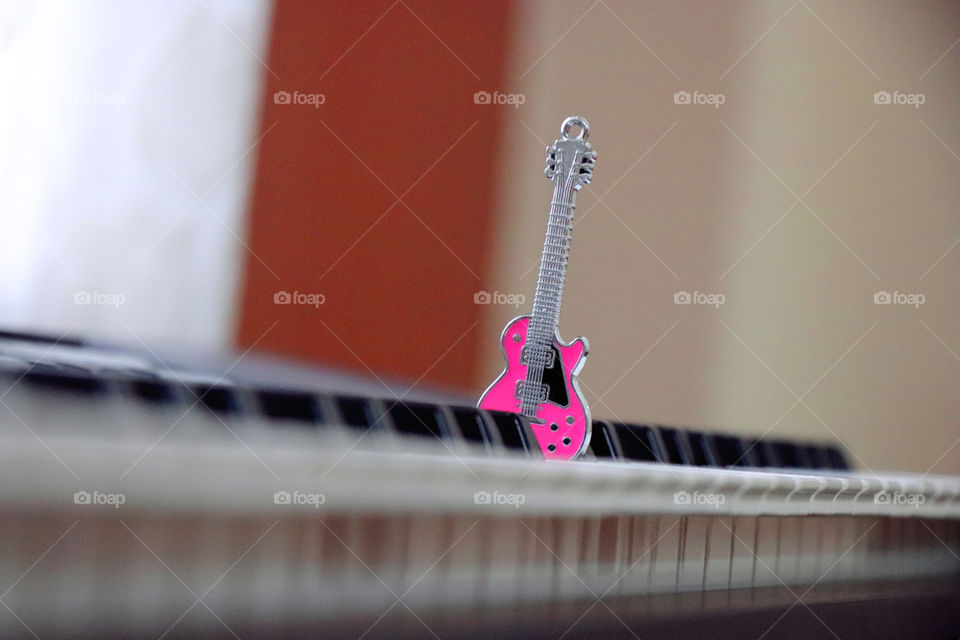 Guitar , guitar wallpaper,guitar keyring, guitar on Piano buttons