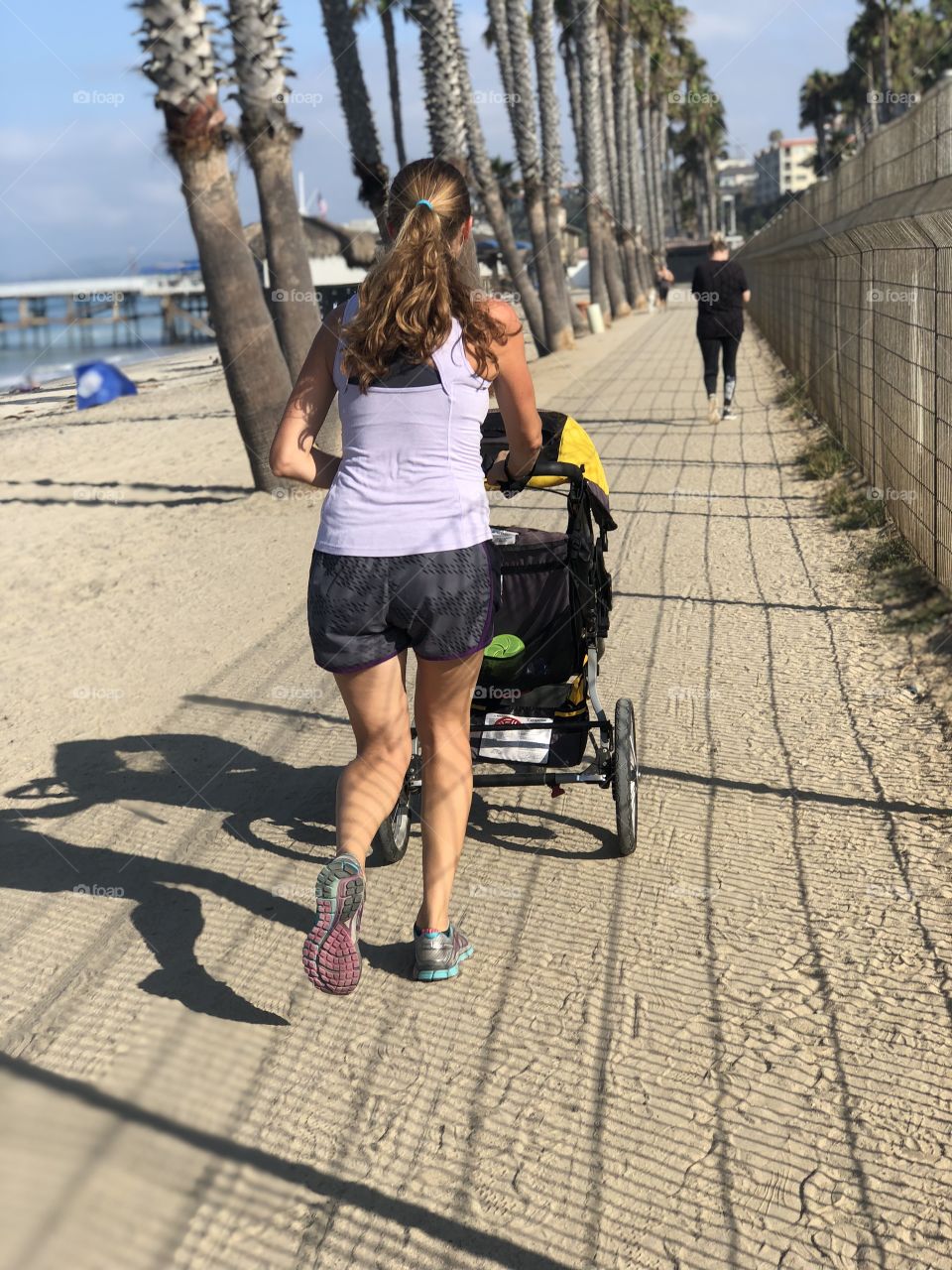 Foap Mission Staying In Shape! Mother Running Pushing A Stroller While Running On A Beach Trail!