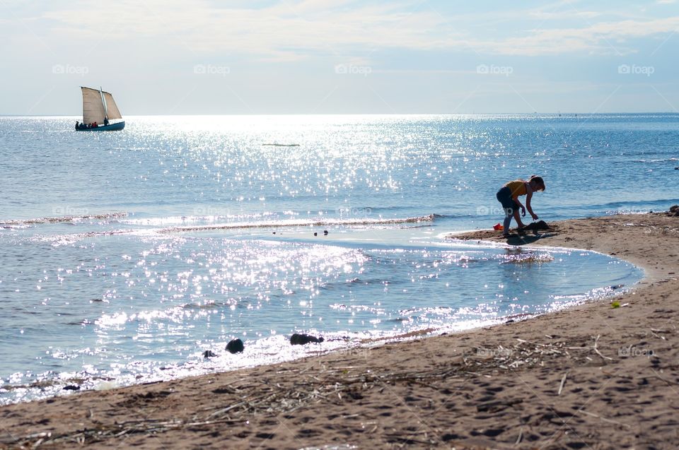 The girl is on the beach