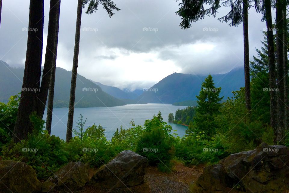 Foggy lake and mountains