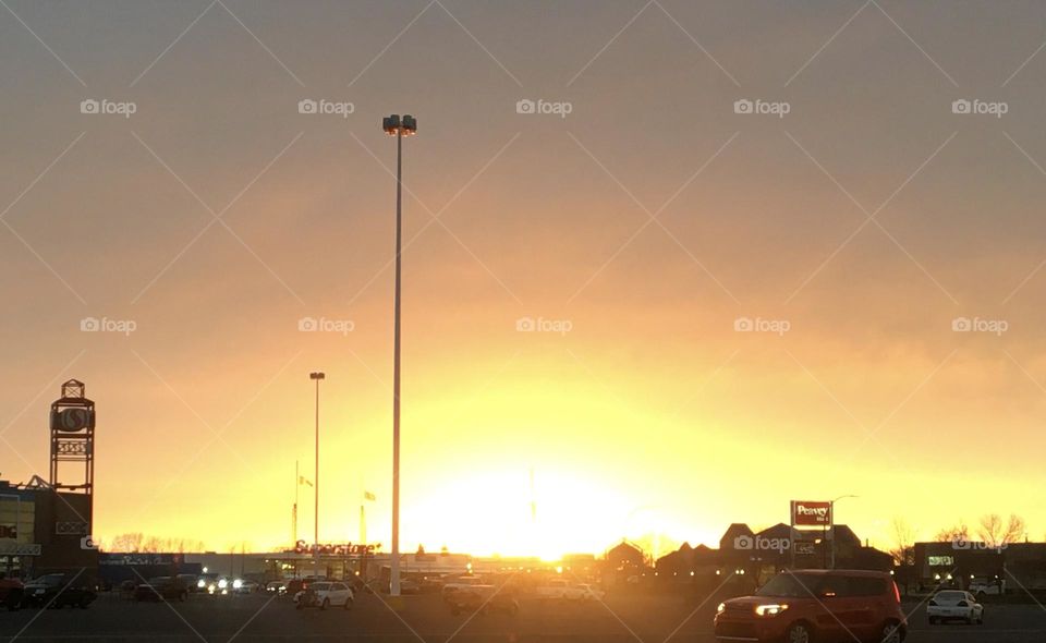 Sunsetting leaving a rainbow of colors in the sky over the small city of Medicine Hat, Alberta, Canada 