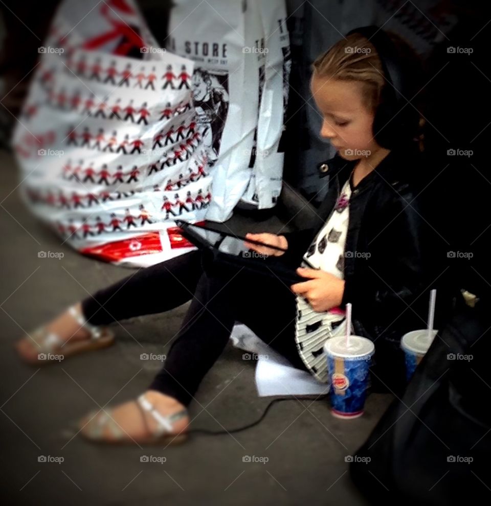 Young girl connected to technology