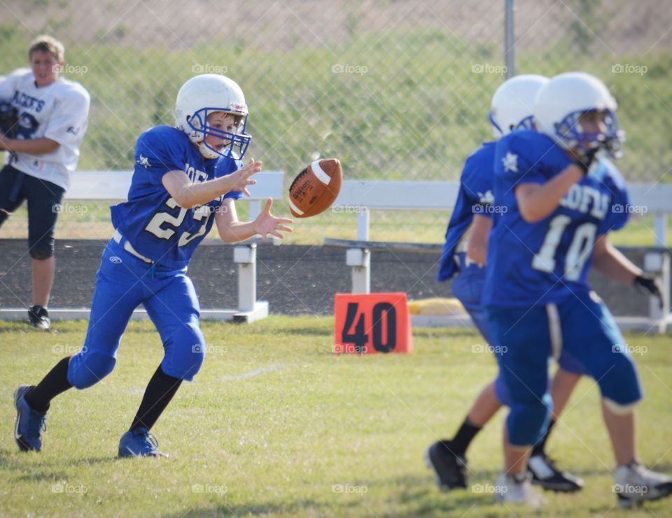 Teenage football player. 