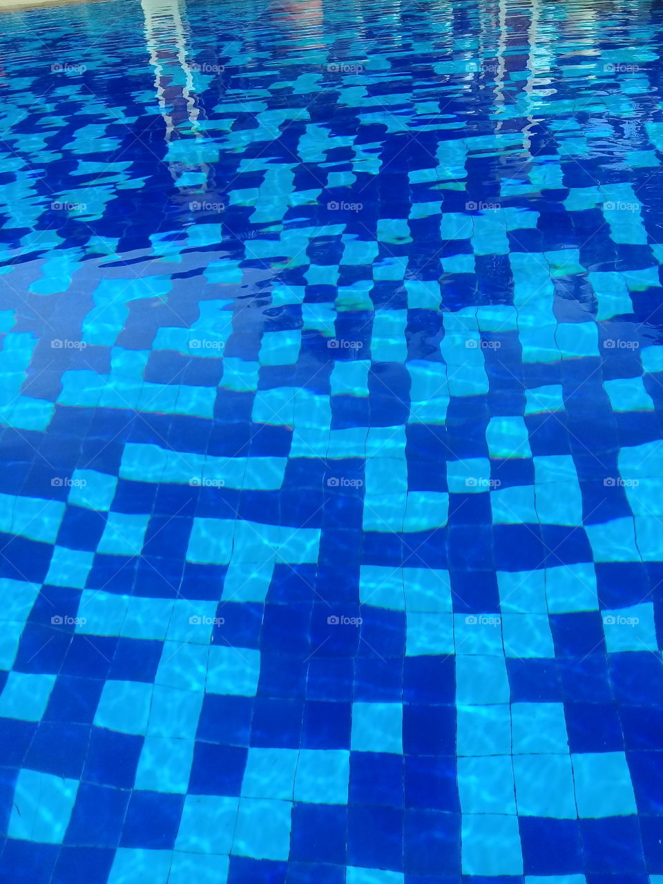 tile patterns in a swimming pool