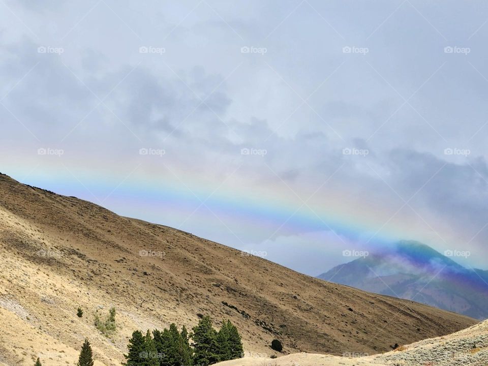 Hill side rainbow
