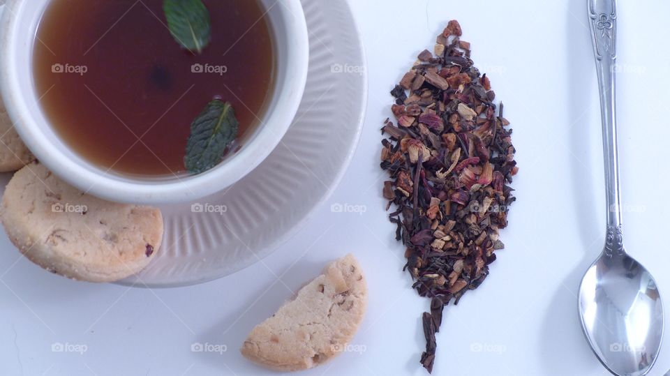 Elevated view of mint tea with tea leaves