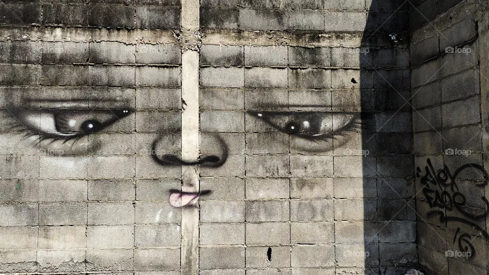 The naughty wall sticks out his tongue