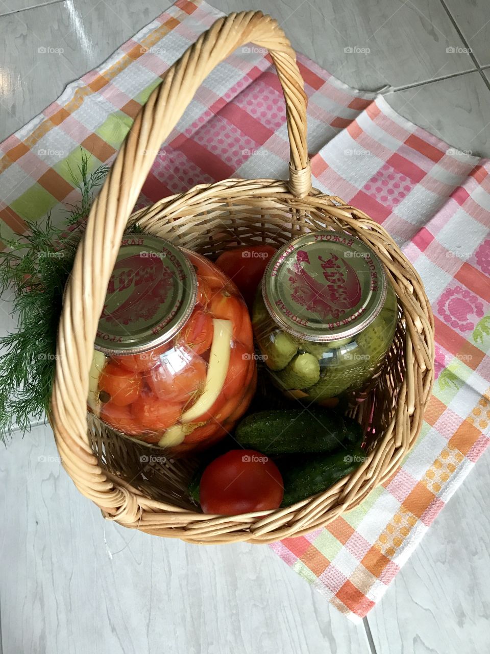 homemade pickles cucumbers and tomatoes 