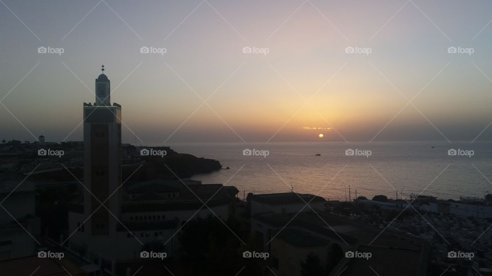 A wonderful sunset view at a city on the Atlantic Ocean