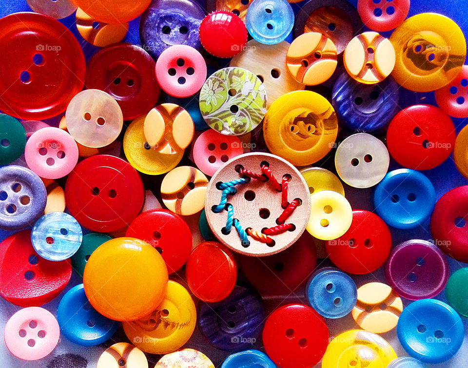 Elevated view of multi colored buttons