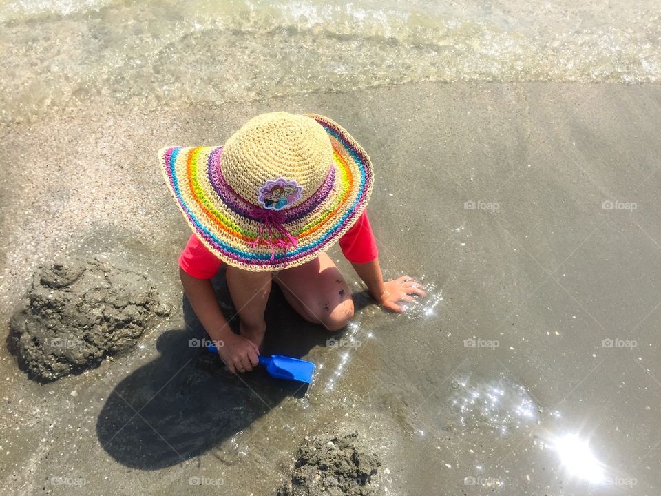 Kids playing in the sand