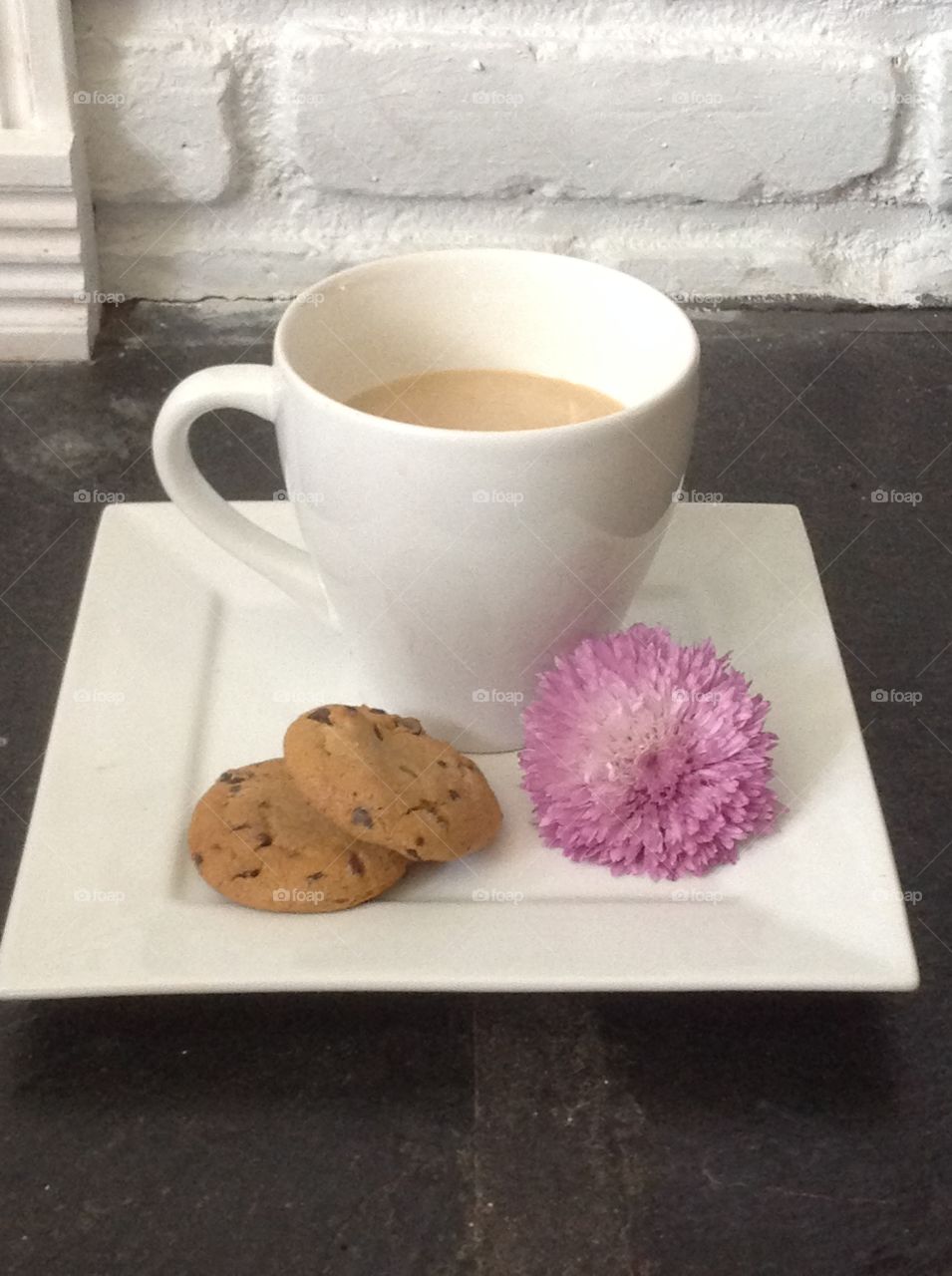 Enjoying a cup of coffee outdoors on a beautiful spring day.