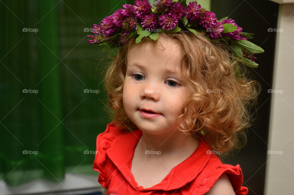 Cute girl with wreath