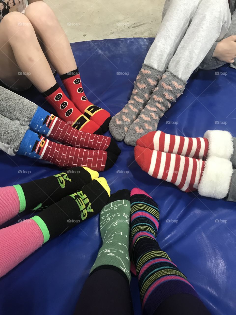I coach gymnastics in addition to my regular teaching job.  This picture was taken at our crazy sock day this year.  Trying to add a little fun to a year that has people staying far apart due to the virus.  