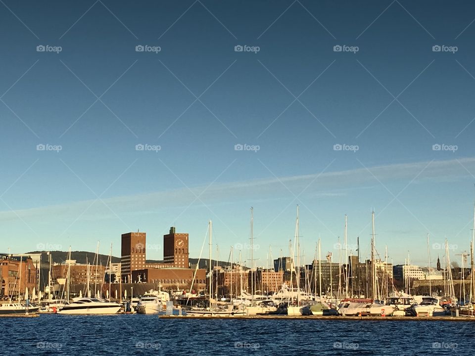 Oslo City Hall, Norway. The Cuty Hall seen from Aker Brygge with the sea in front.