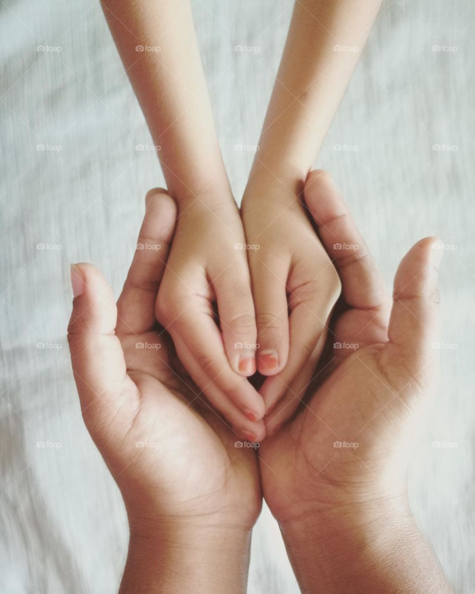 a man holding woman's hand