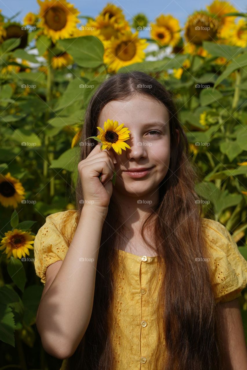 Girl with sunflower