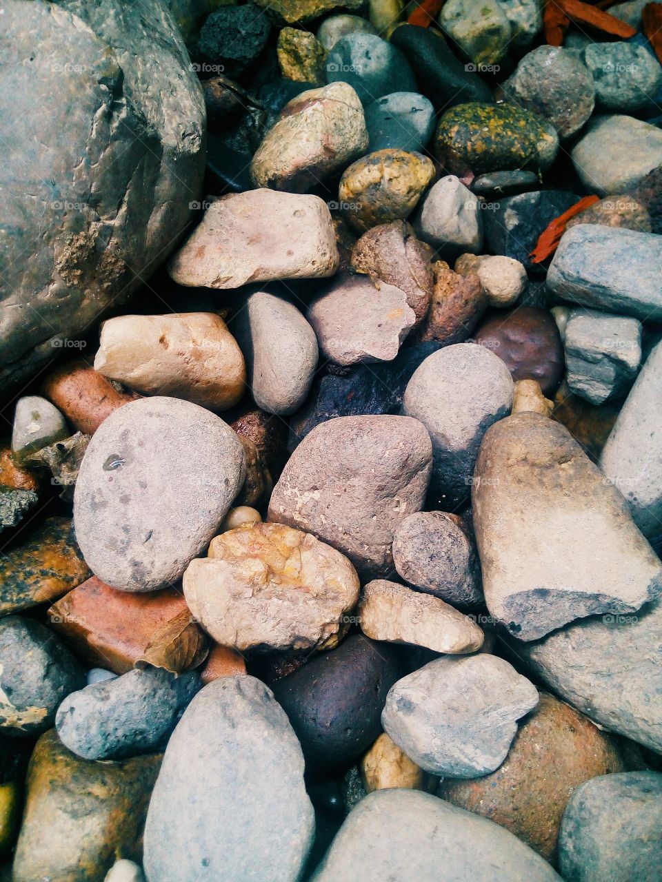 Beautiful Rocks of nature, Scattered around as the rain falls onto them.