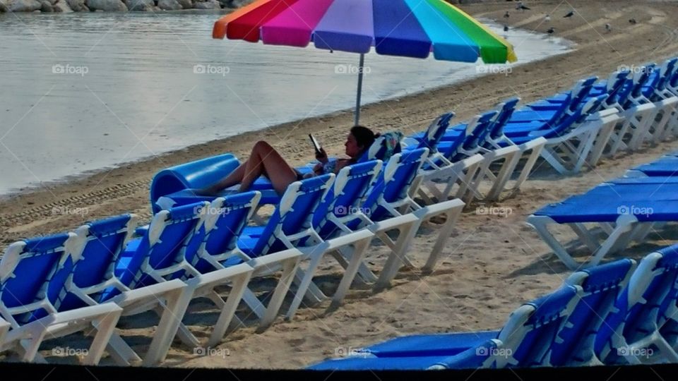 relaxing with iPad.. Coco cay Bahama's Royal Caribbeans private island