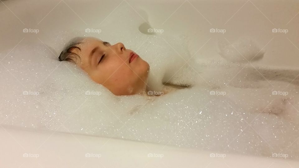 Child in bath tub