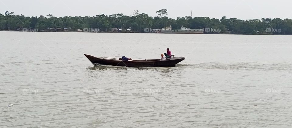 Driving boat in the river