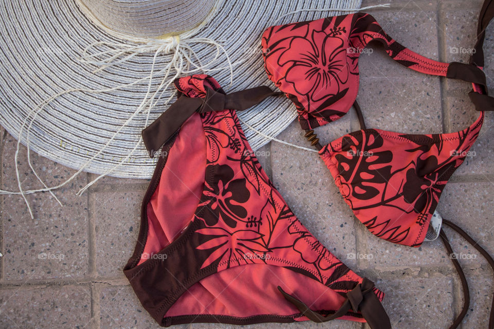 Orange bikini and a hat