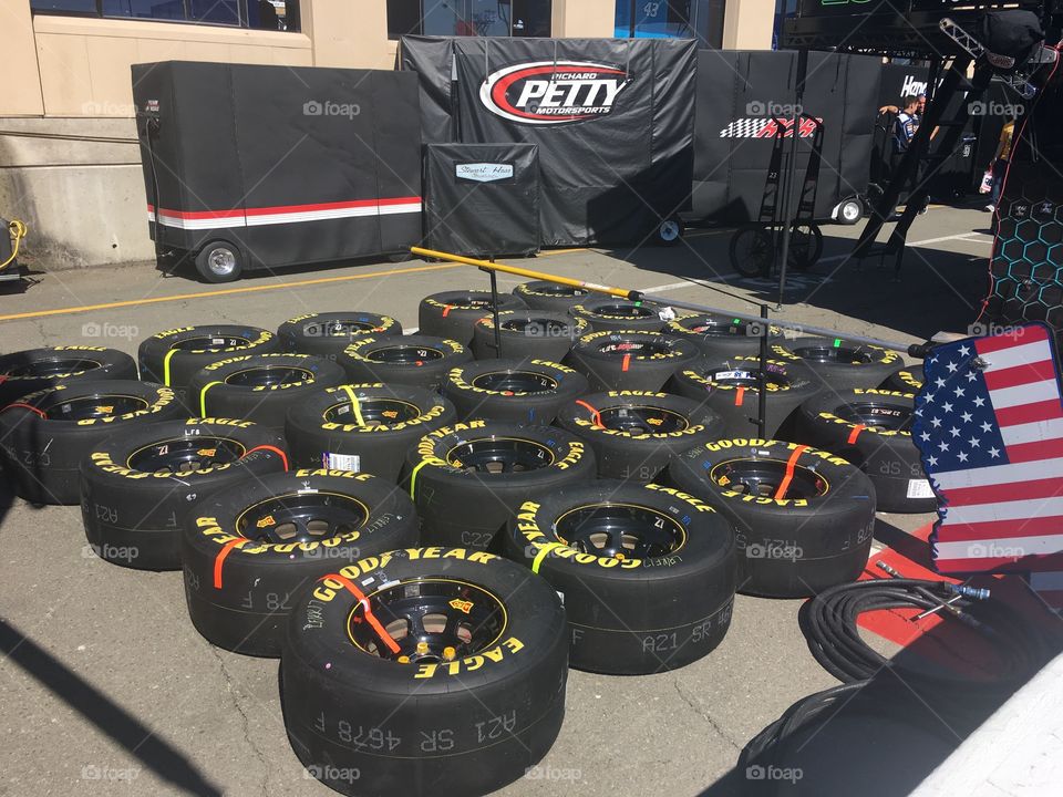 Goodyear Racing Eagles set out for the race at Sonoma, tires. Pit stop, tool box, rubber. 