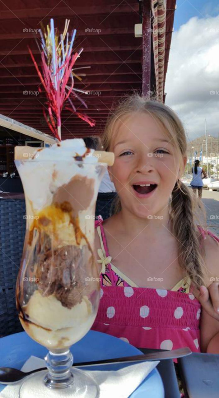 child's amazement at her huge treat