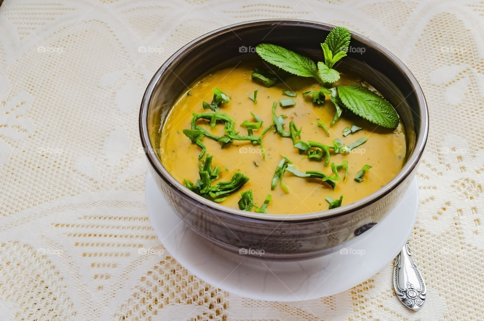 Bowl Of Pumpkin Puree Garnished