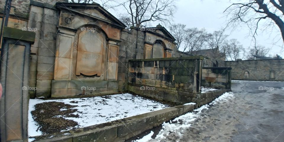 old graves in snow in winter.