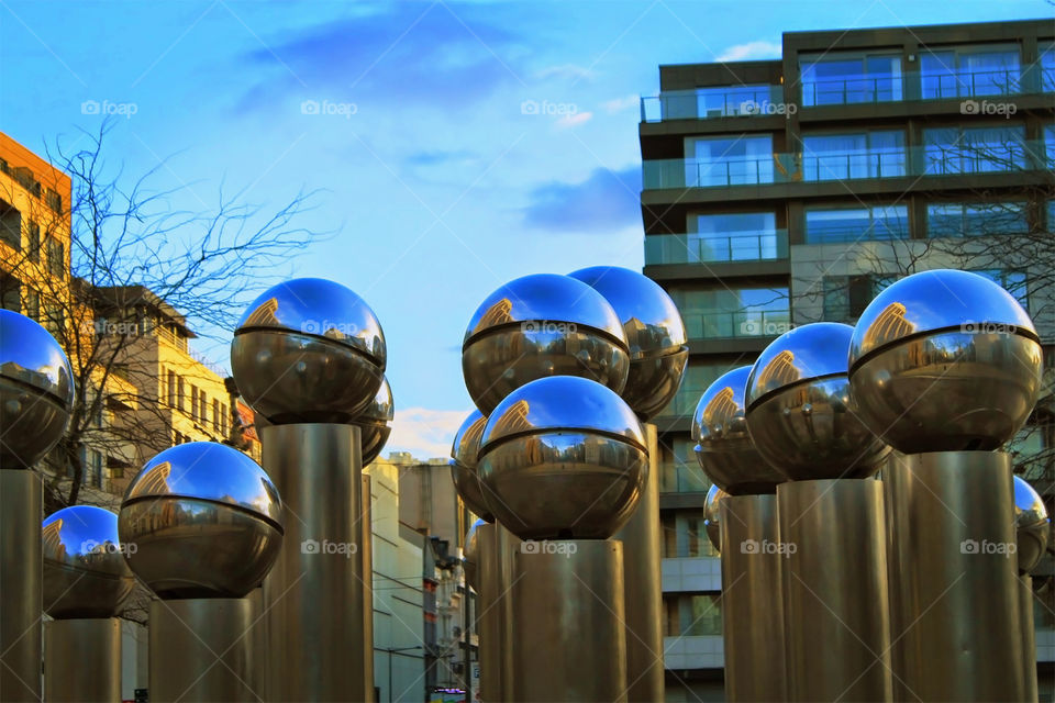 Installation art reflecting buildings of the city Brussels