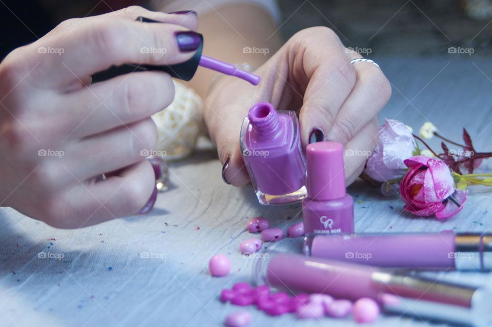 woman doing manicure