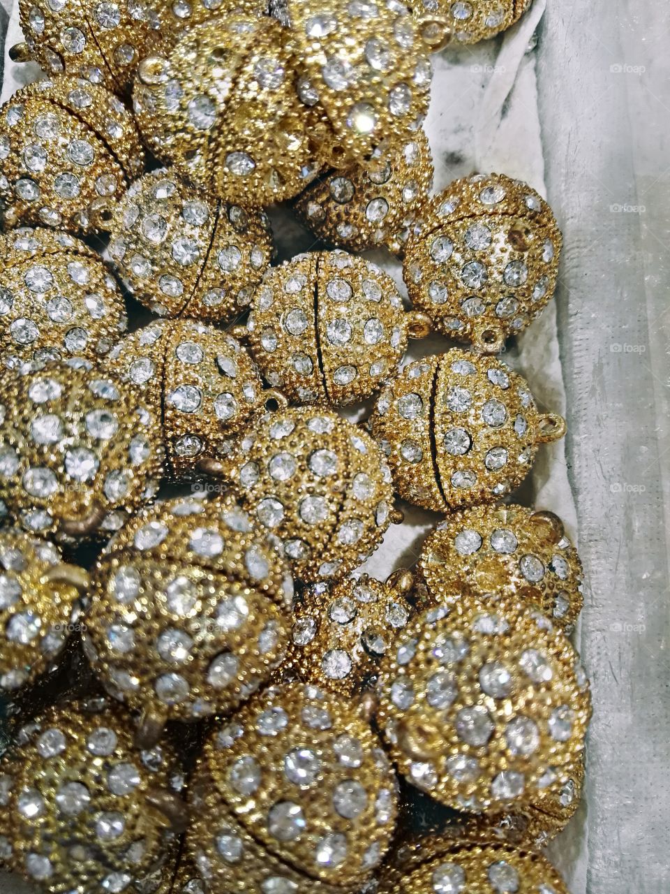 Full frame of golden spheres