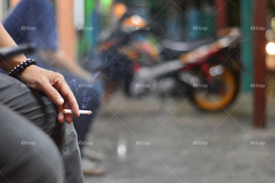 Smoking cigaretes
