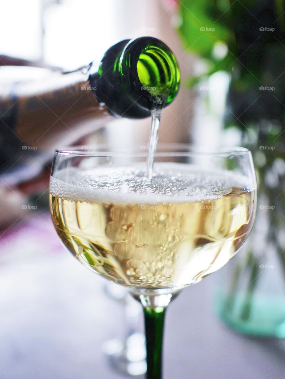 Pouring Cava in a glass 