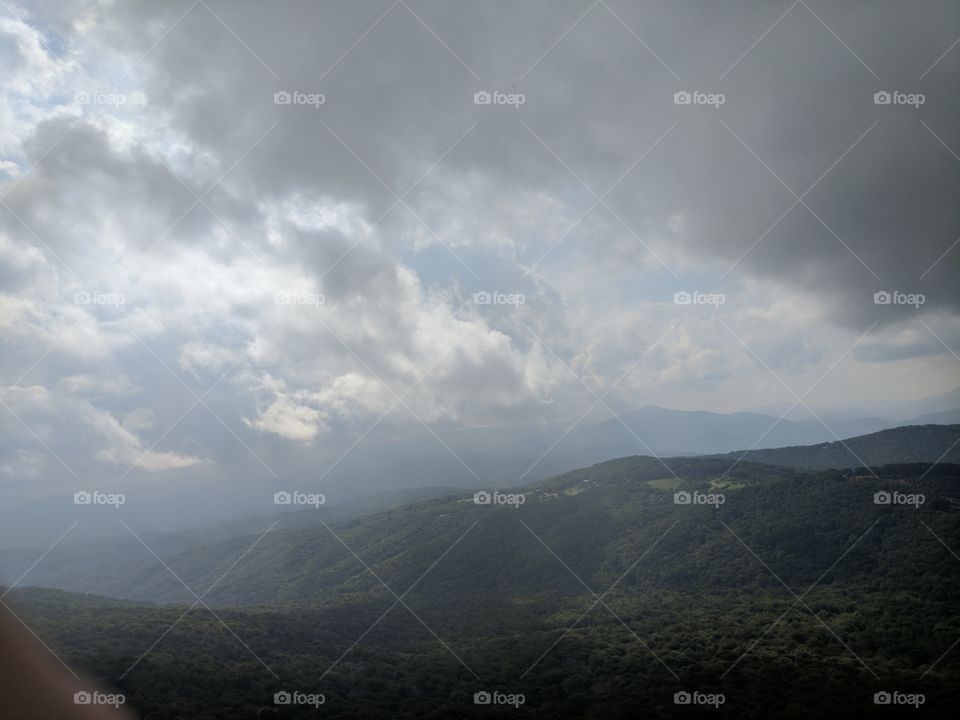 Cloudy Day from Atop Sugar Mountain  In Banner Elk, North Carolina, USA.

Alternate Title: Knocking on the Sky 6