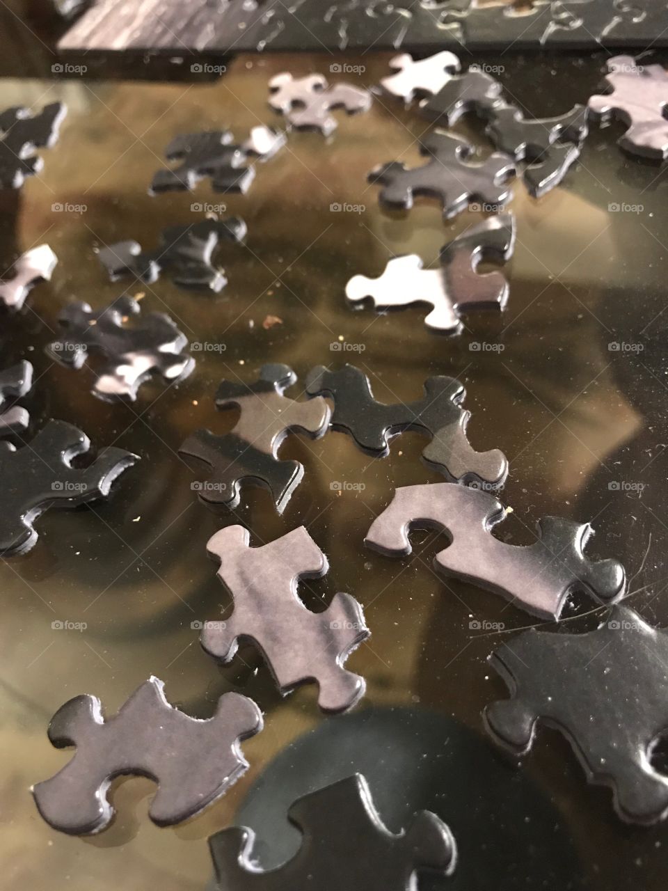 Black and white jigsaw puzzle pieces