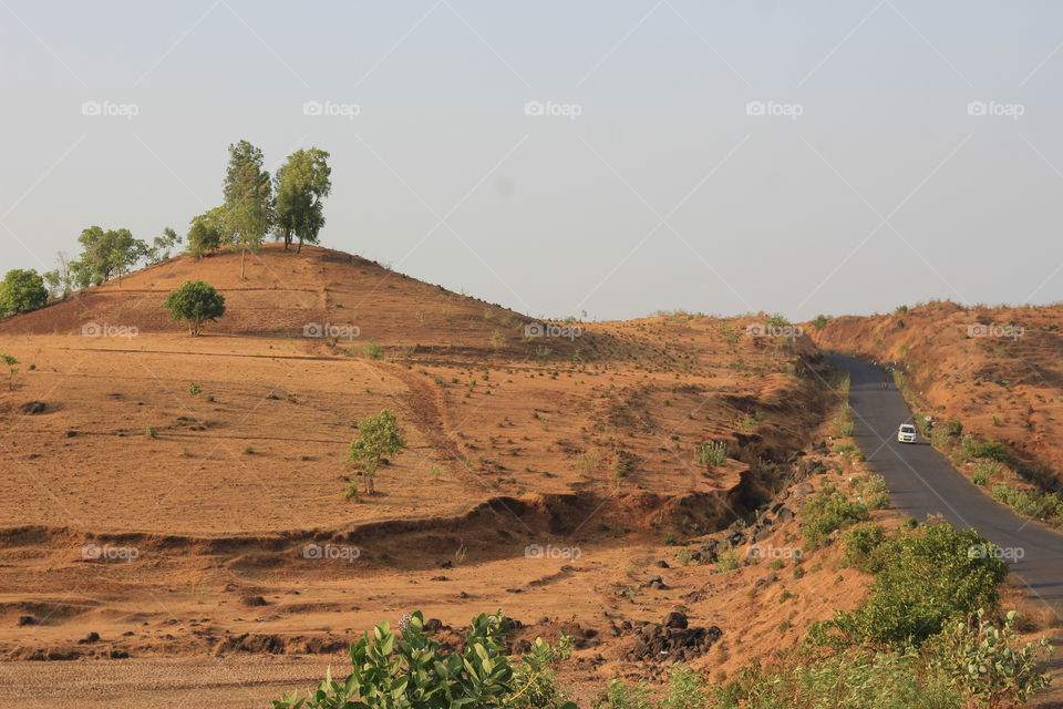 Road passing through hill