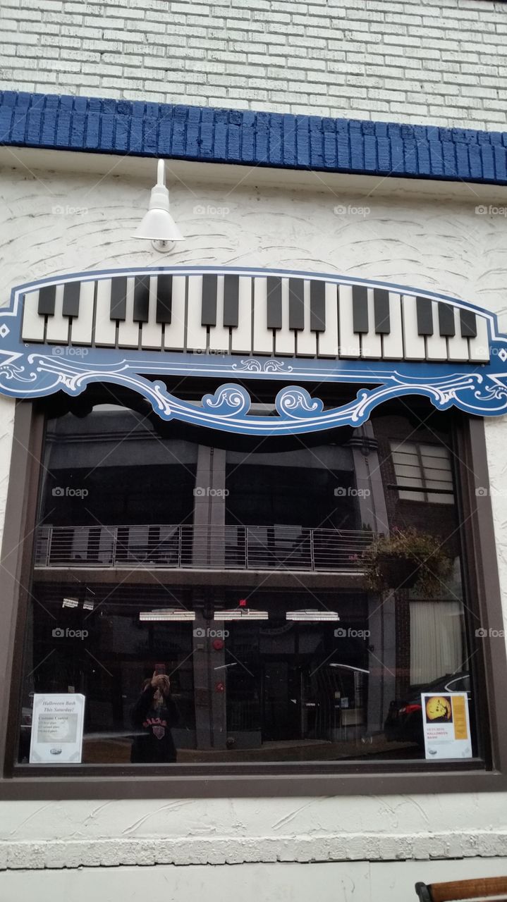Piano bar window. local piano bar decorative window