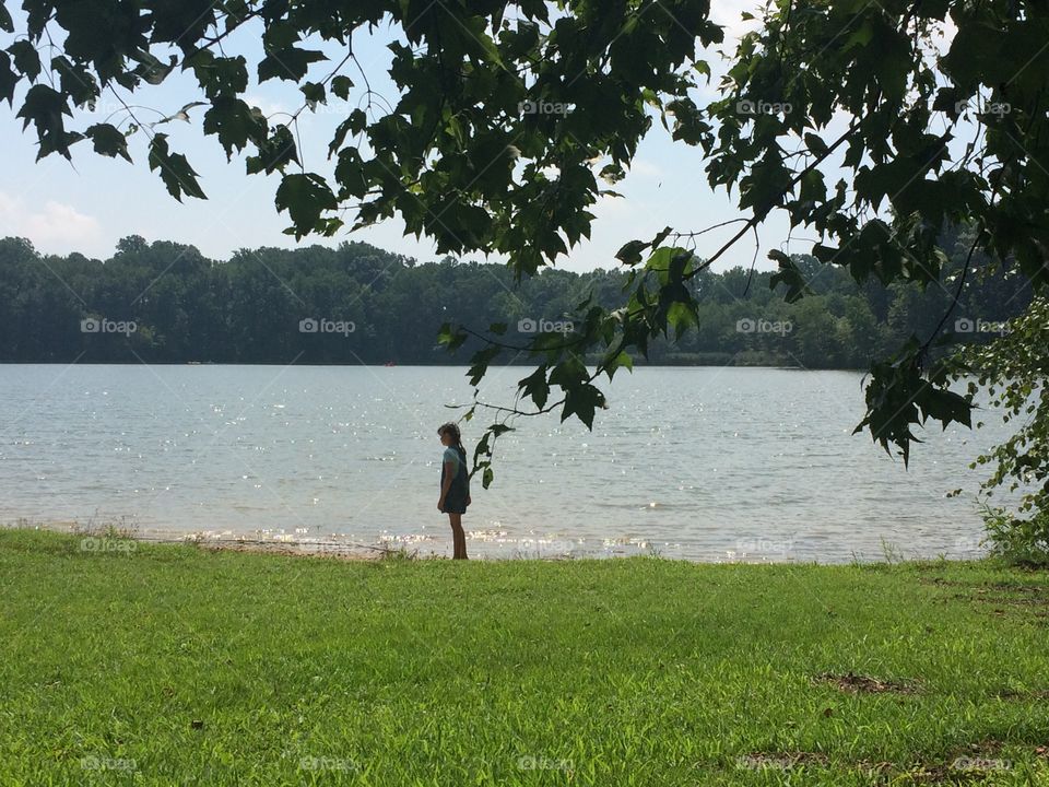 Girl at lake 
