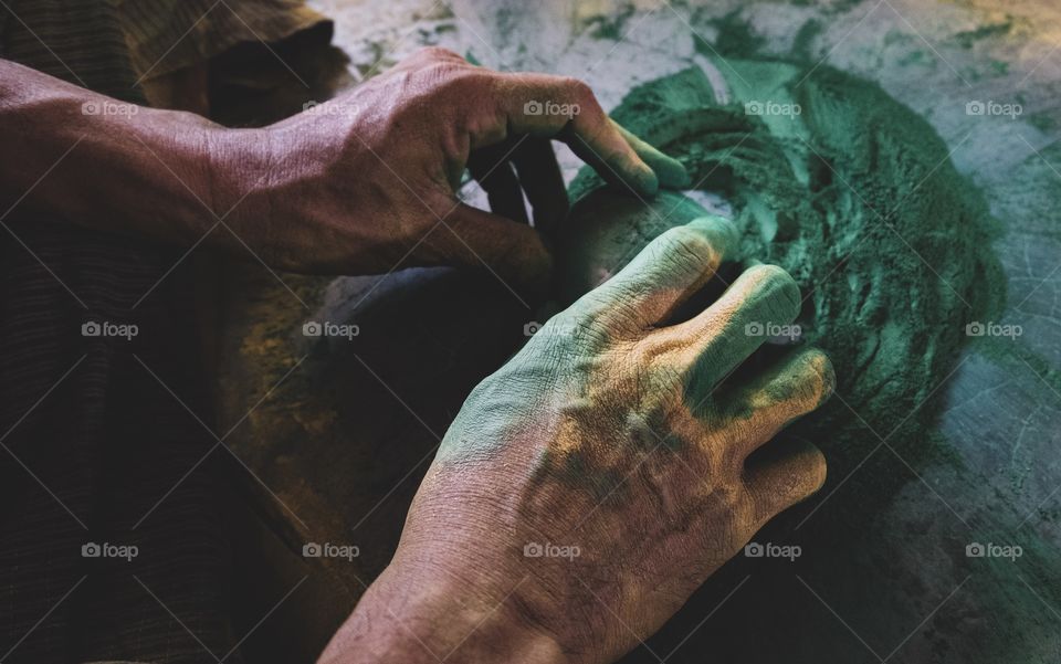 Man is making natural color for Bamboo product at Local Handcraft factory in Bagan Myanmar