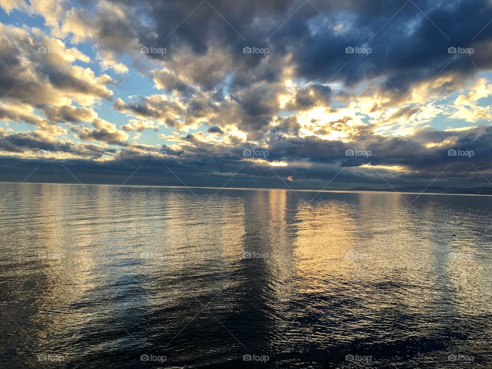 Sun-rays illuminating  thousand clouds