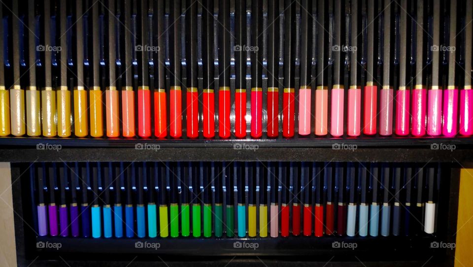 Many colored pencils.