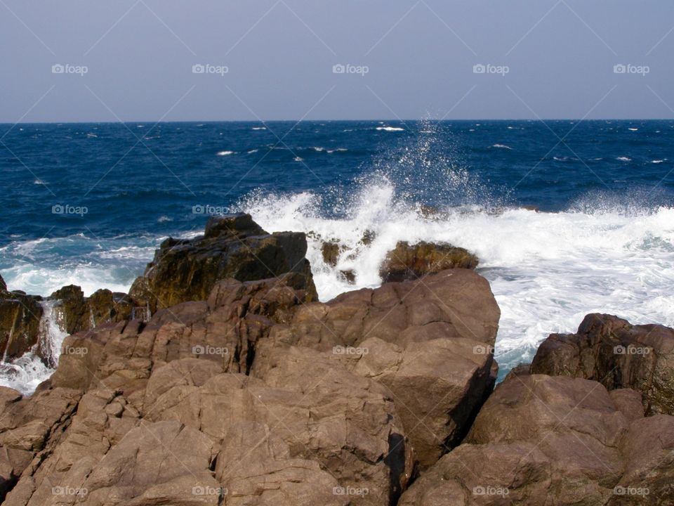 Sea coast with rocks and waves