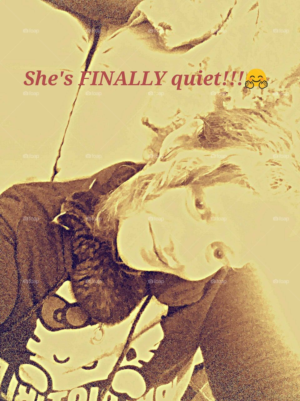 Woman extremely happy that the little kitten FINALLY stopped crying even if it means she can't move.