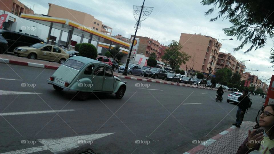 Beautiful and ancient car in the street.