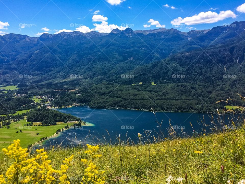 Heart shaped lake in European alps in summertime 