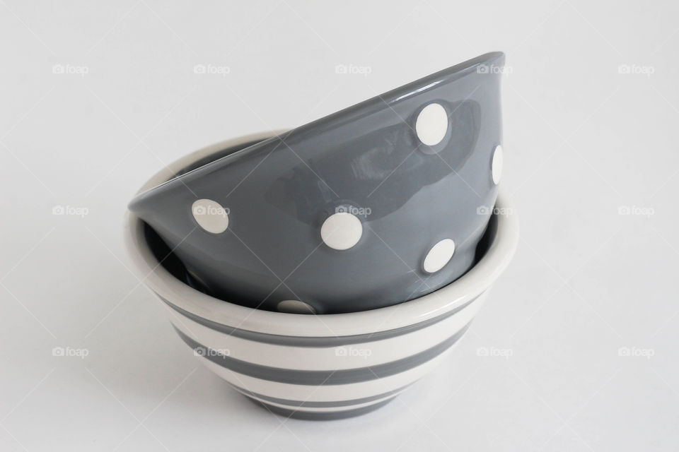 Two bowls with circles and stripes