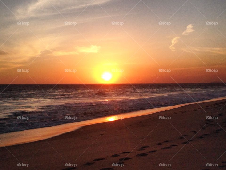 Scenic view of beach at sunset in Saquarema